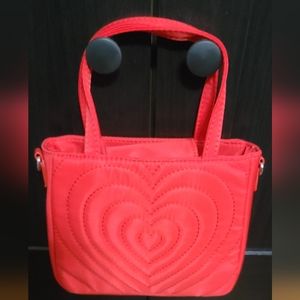 Red clutch bag